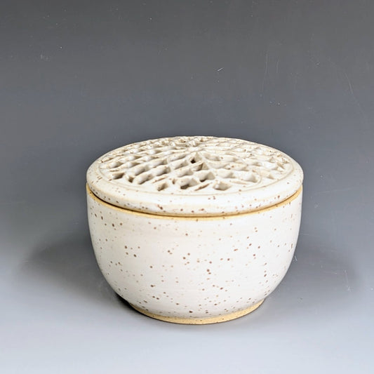 Lidded jar with Rose Window design
