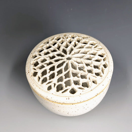 Lidded jar with Rose Window design